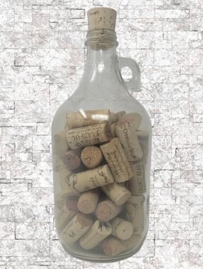 GLASS JAR OF WINE CORKS